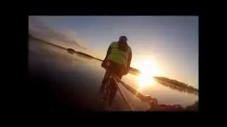 Mountain biking on crystal clear ice lake in Sweden - Beautiful (HD)