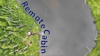 Father and Son Team Work Around Remote 1980's Log Cabin in the Rainy Alaskan Wilderness