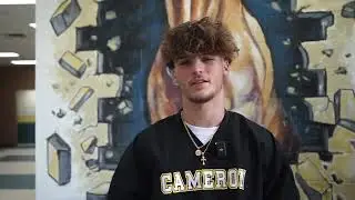 Area track & field stand out signs with Cameron University