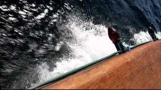 Waves Smashing Against the Side of a Speeding Boat