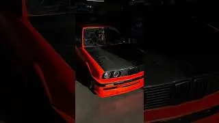 As much as we love to show off the K24 in the engine bay, our new carbon hood fits nicely on our E30