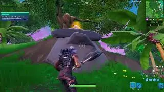Fortnite Season X Challenges - Visit Drift painted Durr Burger head, dinosaur, stone head staue