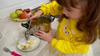 Fooled her twin! Pretend to play with toys