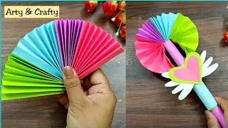 homemade very cute hand fan with waste things