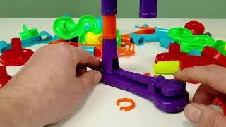 Assembling a track with building blocks Satisfying marble run race