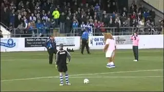 Chester Mascot takes penalty against as giant Rice Krispy