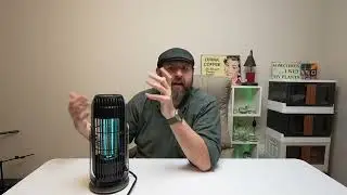 Modern bug zapper with C02 generator and light sensor