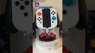 Sonic is holding my Nintendo switch controller 