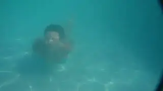 Beautiful girl model underwater swimming pool Miami Swim Week swimwear bikini Fontainebleau resort