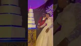 GRAND ENTRANCE OF UZUMKPUME.AND WIFE