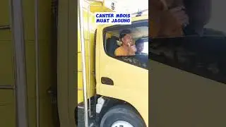 truk canter muat jagung basah