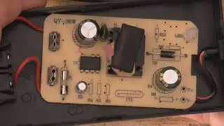 Is this a charger, or a joke? (and attempted repair)