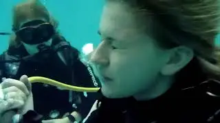 Sexy scuba girl panic underwater