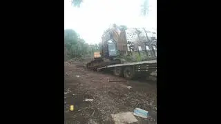 cara menaikkan excavator ke teronton