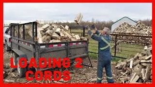 Loading 2 cords firewood. 2 hours in 3 minutes by old geezer