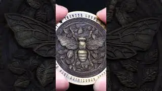 Intricate 3D embossing on brass coins made by Aurora Lite #thunderlaser