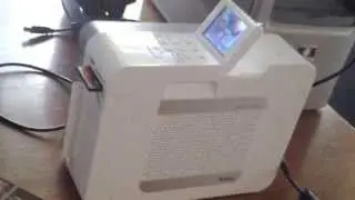 Hiti P110s  pocket studio photo printer in action