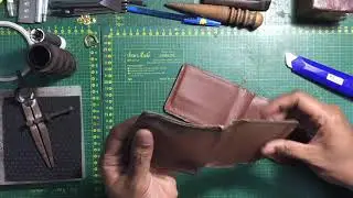 Time lapse video of reconstruction a worn out Louis Vuitton wallet