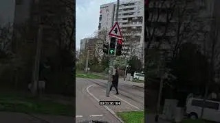 Motorcyclist must run a red light.