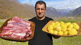 Cooking the neck of the sheep in countryside (outdoor cooking)