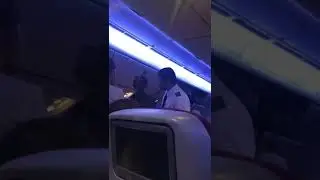 Beggar begging inside Aeroplane
