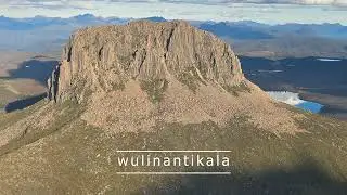 Flying over Cradle Mountain in Tasmania. Bushcat ultralight aircraft exploring the wilderness.