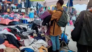 27. French flea markets in the suburbs of Paris. Dress by Kenzo. 