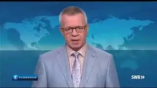GEZ finanzierter SWR hetzt gegen Corona Shutdownkritiker. Madonna für Rainald Becker über dem Volk.