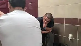 Coach Wrapping Hands Before MMA Fight