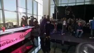 Ryan Seacrest runs from Cooper Robinson, American Idol Los Angeles