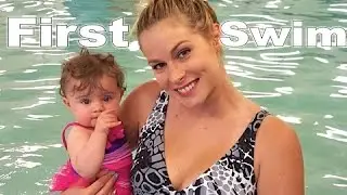 BABY'S FIRST SWIM
