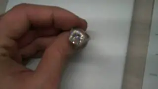 Halo Engagement Ring With Cushion Cut Center Diamond