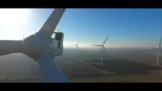 Flying Through Moving Wind Turbines (no joke) HD Drone footage