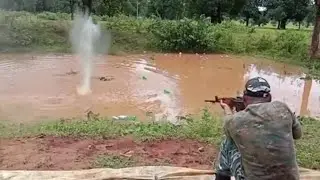 CRPF Soldier Shooting Balloons with 5.56mm INSAS Rifle to Improve Aim