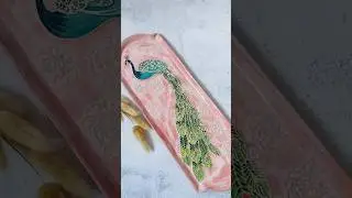 Painting and glazing peacock platter. Checkout the full tutorial in my channel! #handmadeceramics