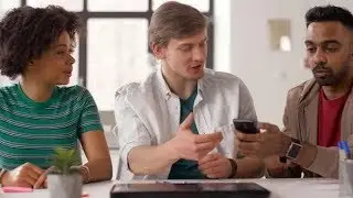 Man Showing Smartphone To Coworkers at Office 35 | Videohive Project Templates