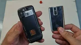 How to change, remove the battery from a cell phone, mobile phone, Nokia E66 Smartphone