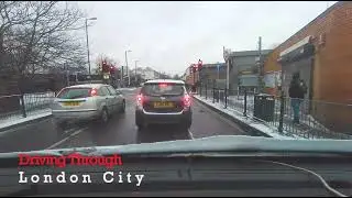 Driving Through Snowy London City