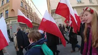 Polish patriots singing  on Ulica Florianska in Krakow on  independence day - 11th November.