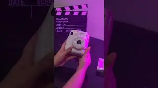 Cómo se cambia la película de fotos a cámara instantánea 