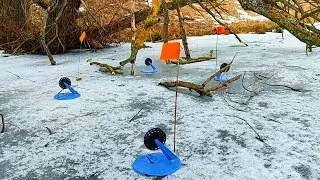 This lake is teeming with pike. Fishing with tip-ups