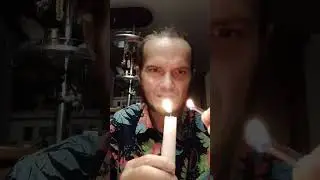 Зажигаю свечу через дым. 