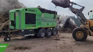 Neuenhauser Umwelttechnik - TARGO 2500 shredding roots, stumps, landscape