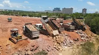 Fantastic Pushing Stone And Dumping To Filling Up On Huge Area By Larges Bulldozers And Dump Trucks