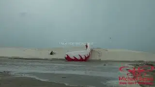 06-18-2024 Port Aransas, TX  - Storm surge begins to rise, winds cause paraglider issues