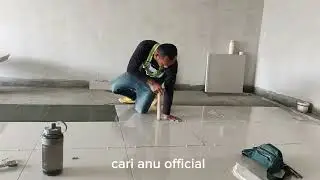 proses pemasangan keramik granit ruang tamu