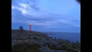 SOLEN MÅLAR BERG OCH HAV