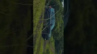 ScorpioN black SUV in mountains