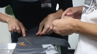 Dads Grip a Skateboard