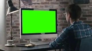 Man Working on Computer with Mock-up Green Screen | Stock Footage - Videohive